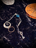 The Spiral Key Pendulum